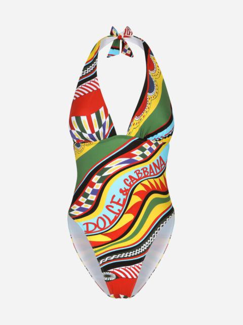 Carretto-print one-piece swimsuit with plunging neckline