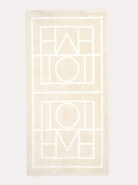 Monogram jacquard beach towel sand