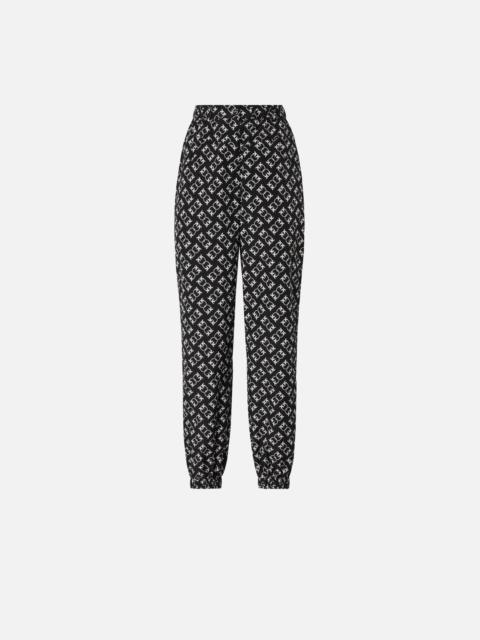 SPORTY TROUSERS WITH ALL-OVER LOVE BIRDS LOGO
