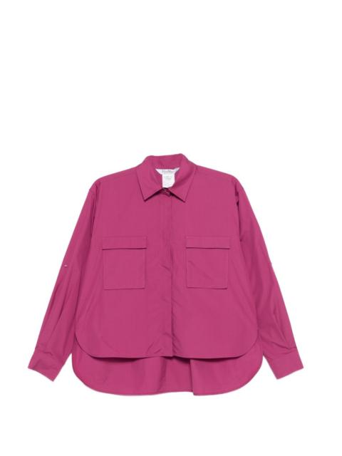 Mtenue flap pockets curved hem shirt