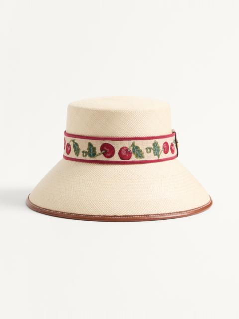 CHERRYFIC STRAW BUCKET HAT WITH LEATHER TRIM AND CHERRYFIC RIBBON