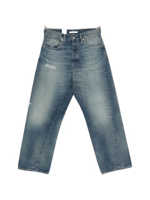 twisted distressed jeans