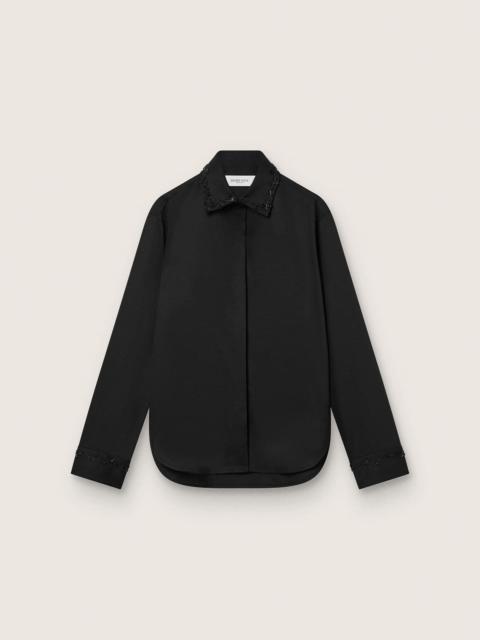 Women's shirt in black wool twill with floral embroidery in glass beads