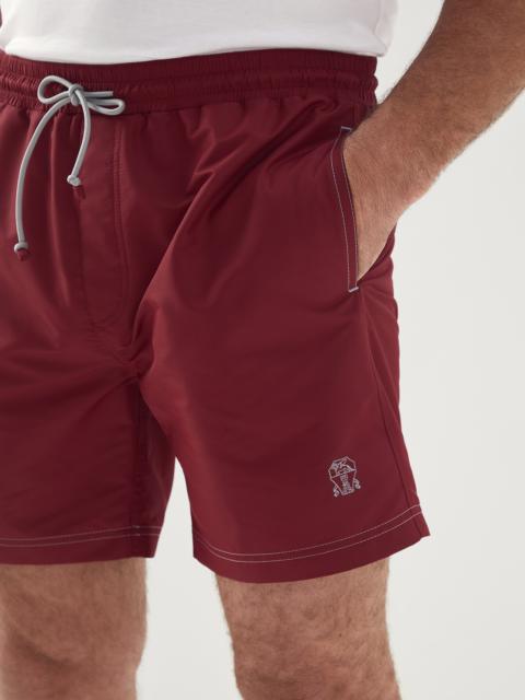 Swim shorts with contrast stitching