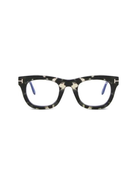 tortoiseshell square-frame glasses