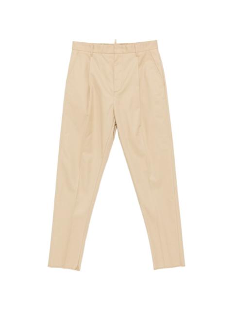 pleated-front tailored trousers