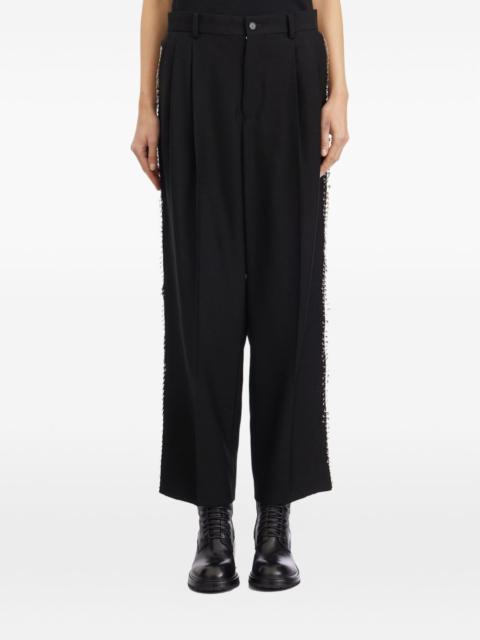 safety-pin cropped trousers