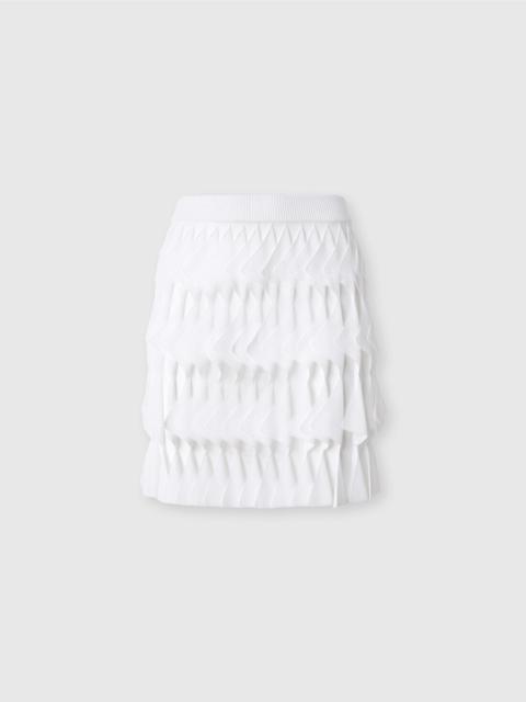 Short skirt with geometric tiers