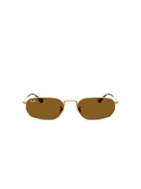 oval-frame tinted sunglasses