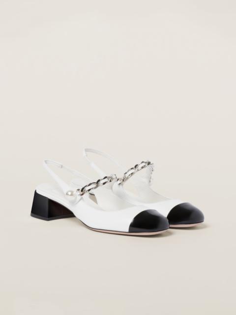 Two-tone patent leather slingback pumps