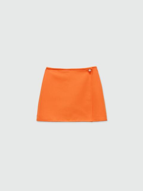 Orange cady miniskirt with "TheMwave" detail