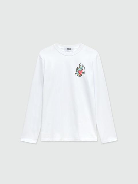 White long-sleeved jersey T-shirt with "Heart on Fire" print