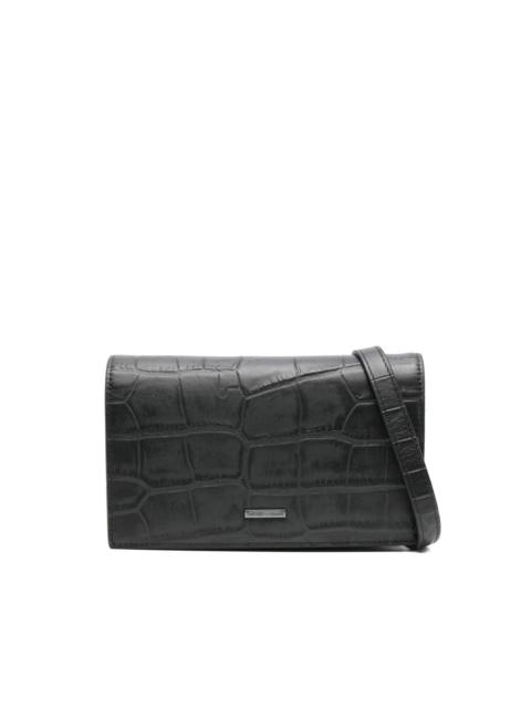 crocodile-embossed leather clutch