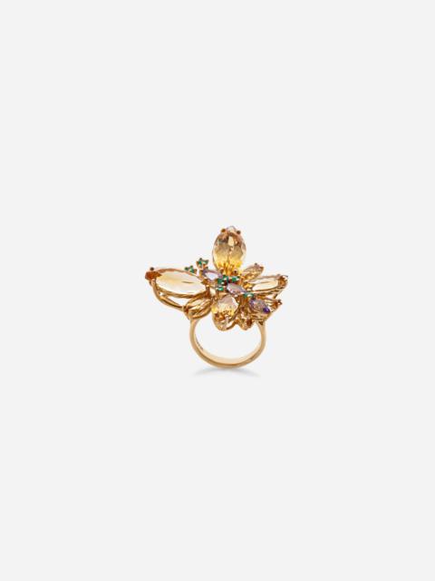 Spring ring in yellow 18kt gold with citrine butterfly