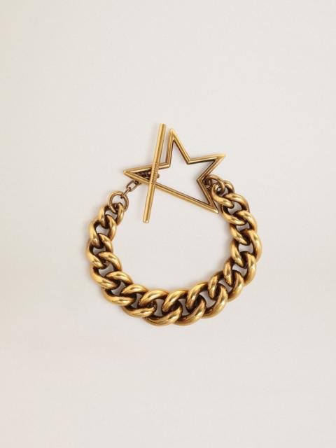 Bracelet in antique gold decreasing chain with star-shaped clasp
