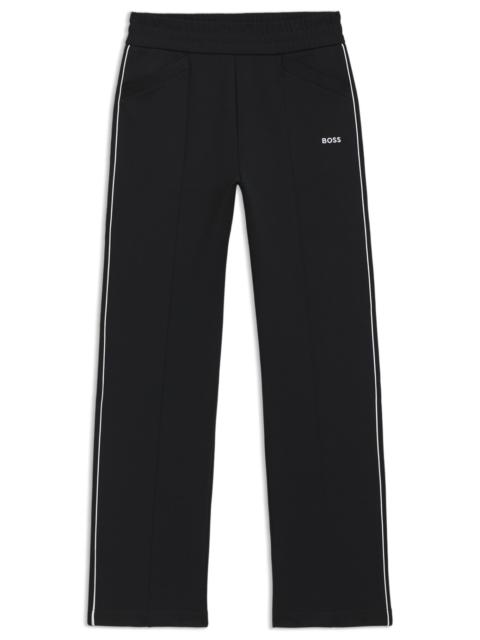 STRAIGHT-FIT TRACKSUIT BOTTOMS WITH CONTRAST LOGO AND PIPING