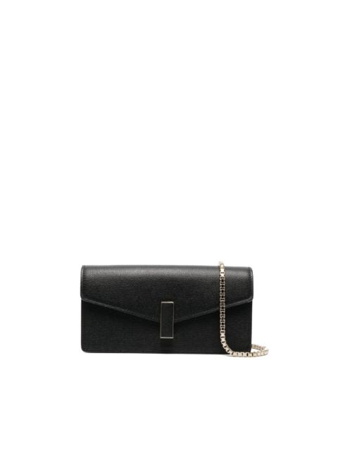 Iside leather clutch bag