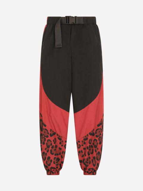 Nylon jogging pants with leopard print