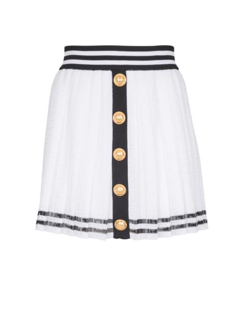 Pleated monogrammed knit skirt
