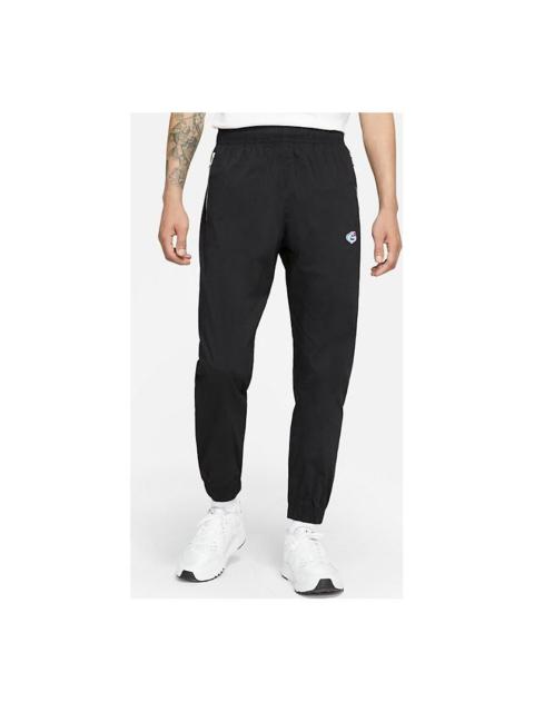 AS Men's Nike Sportswear AIRMOJI WVN Pant T Black DA8748-010