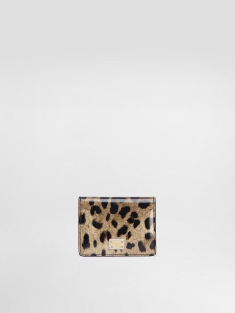 Polished calfskin wallet with leopard print