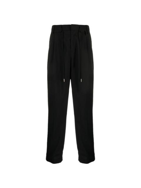 drawstring-fastening tapered trousers