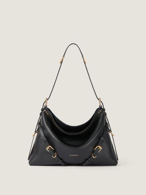 MEDIUM VOYOU BAG IN LEATHER WITH STUDS