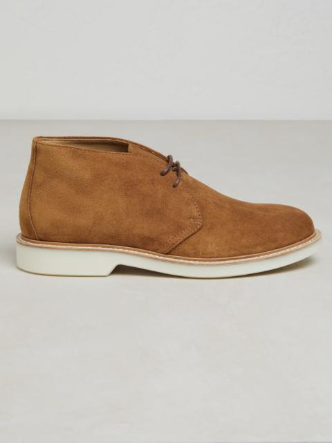 Suede mid boots with white sole
