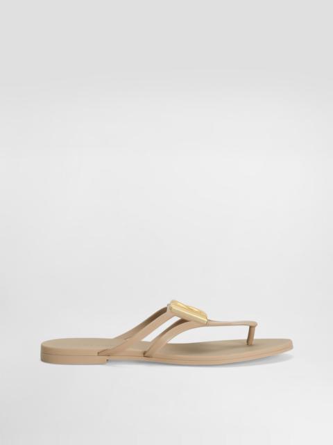 Rubber beachwear slides with logo