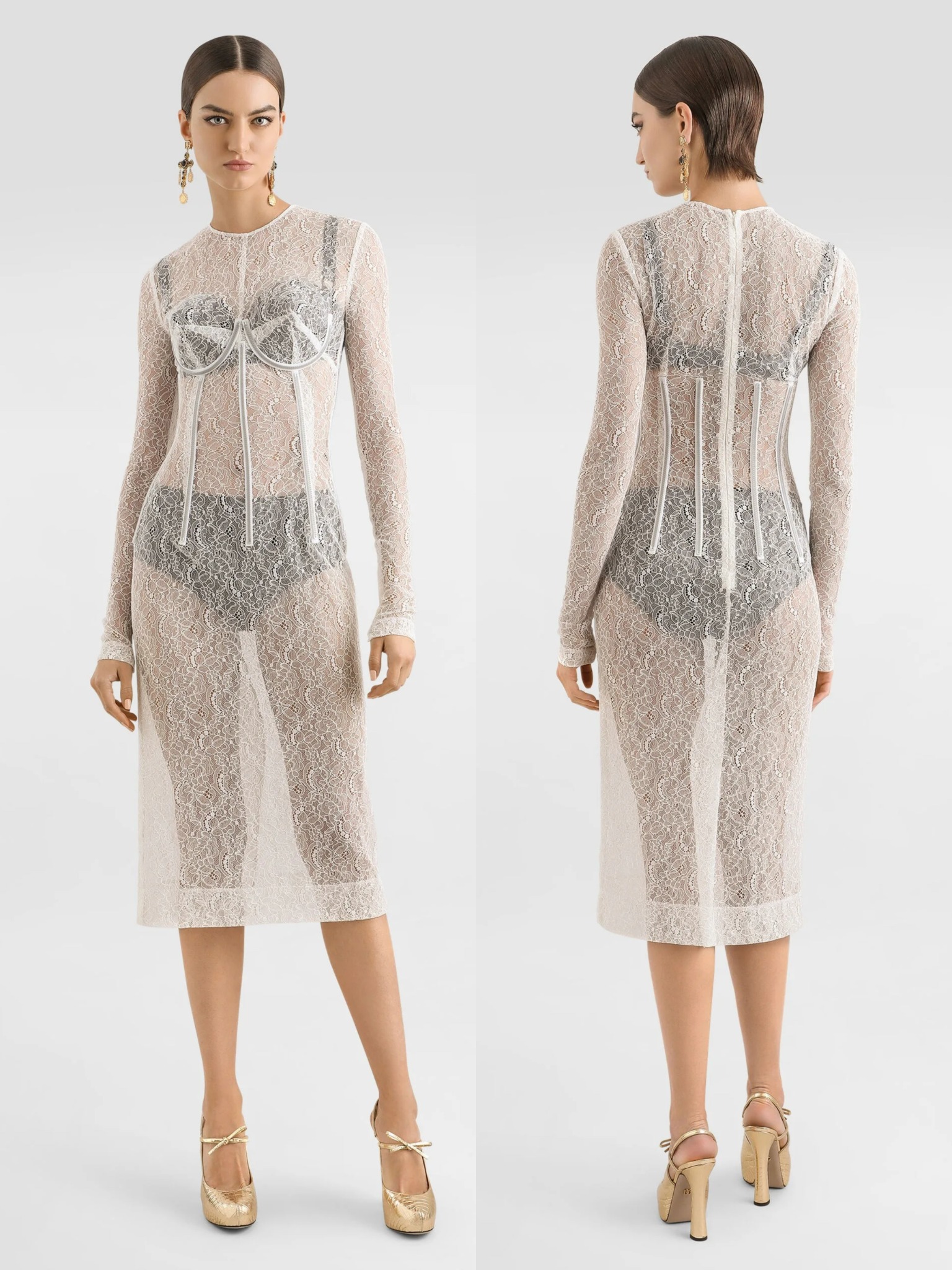 A 1950s-inspired black lace calf-length dress featuring corset-style waist detailing.